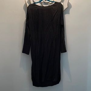 Dressy shirt dress. Buttons down the sleeves.